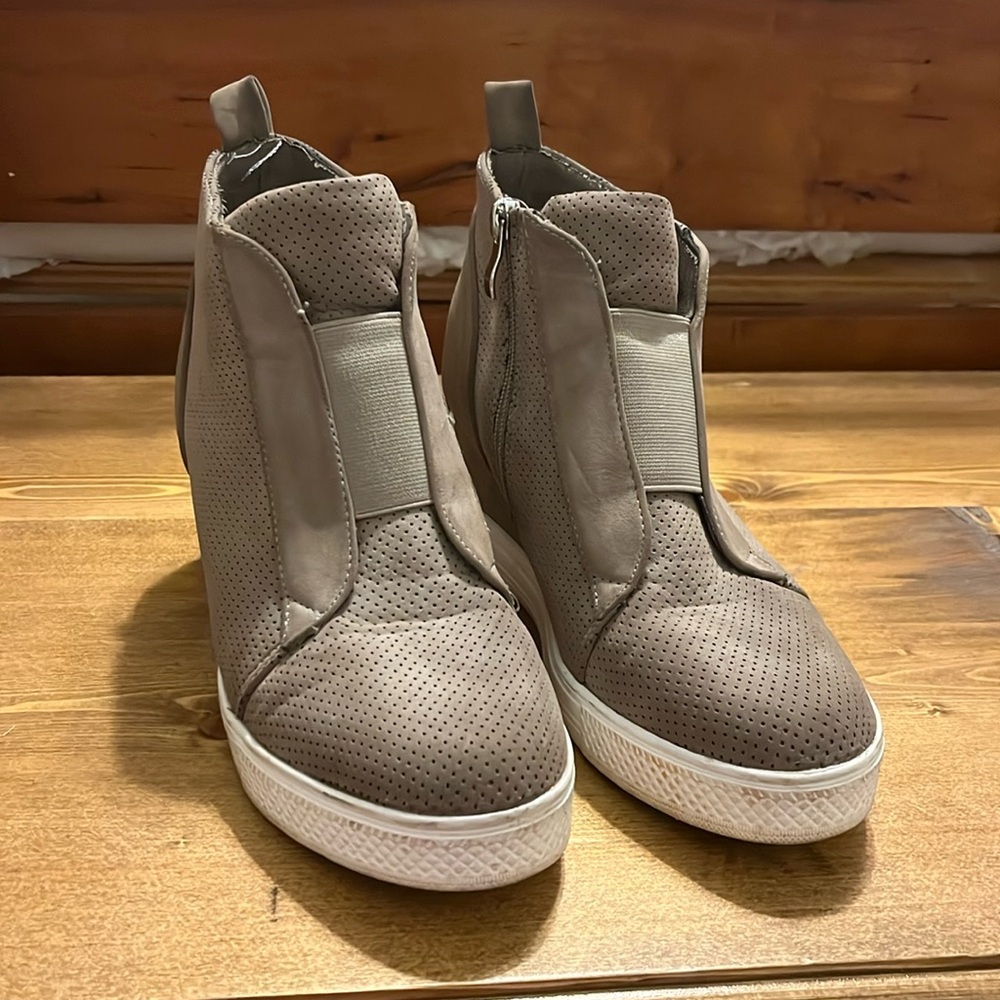 Brown and white booties.